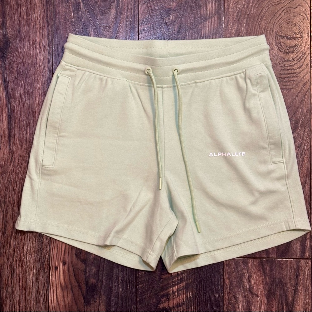 Alphalete green athletic shorts size medium